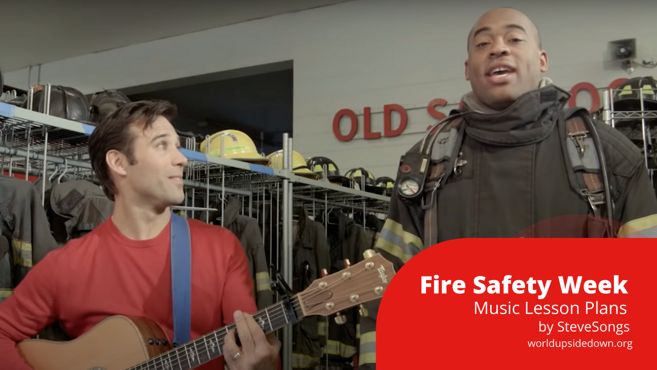 SteveSongs playing guitar and singing songs about fire safety with firefighter